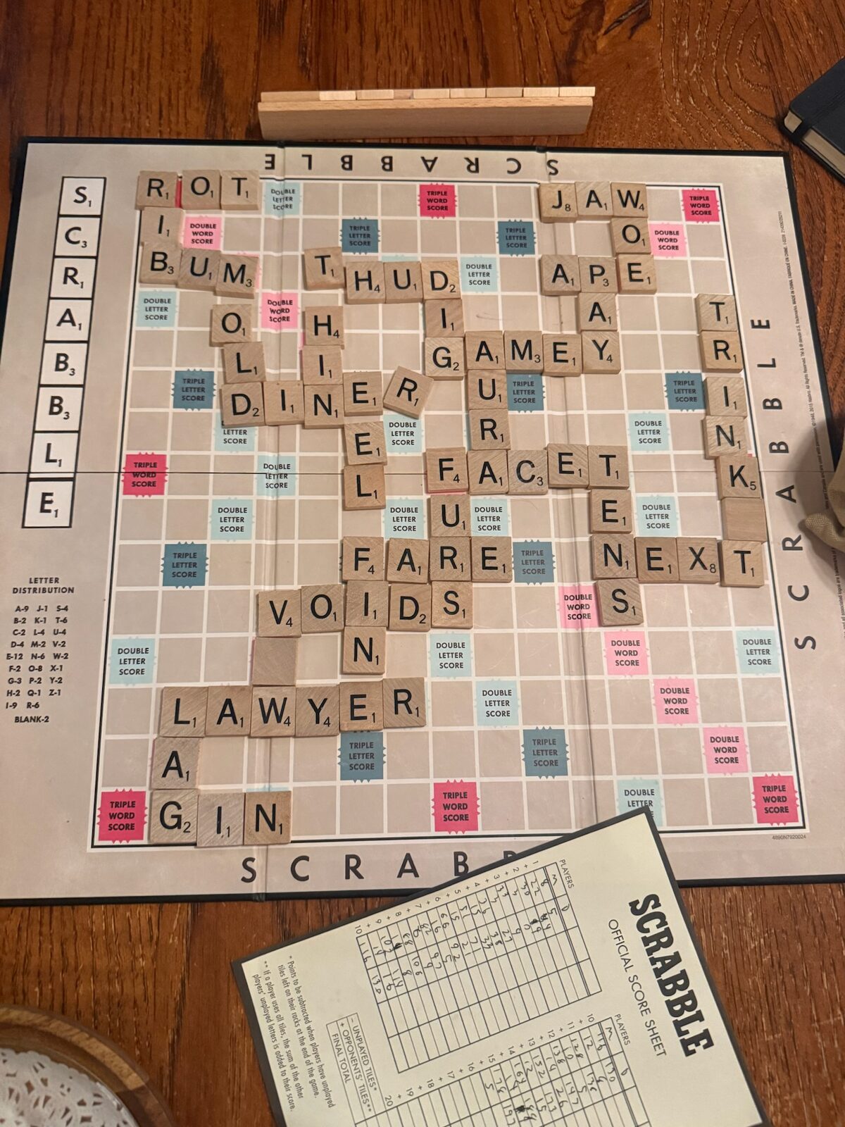 A finished Scrabble board on the cabin table