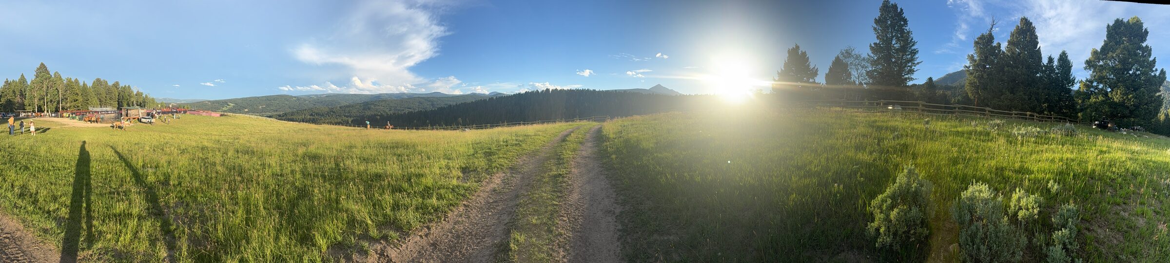 Panorama of sunset over the rodeo meadow